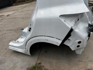 ĆWIARTKA BŁOTNIK WANNA PAS TYLNY TYŁ LEWY DACIA SANDERO STEPWAY III 369