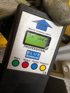 BŁOTNIK LEWY PRZÓD GENESIS GV70 BIAŁY AKRYL