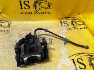 ZACISK HAMULCOWY TYŁ TYLNY LEWY RANGE ROVER EVOQUE II L551