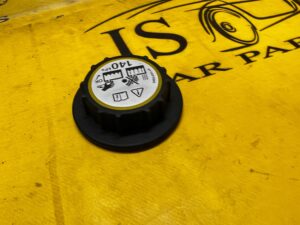 KOREK ZBIORNICZKA WYRÓWNAWCZEGO JAGUAR LAND ROVER