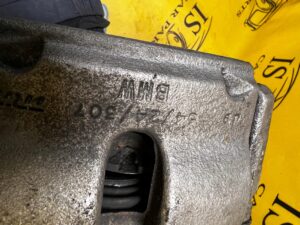 ZACISK HAMULCOWY PRAWY BMW SERIA 1 F40