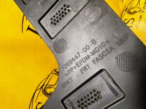 ŚLIZG MOCOWANIE ZDERZAKA RAMKA HALOGENU PRZÓD LEWY TESLA MODEL 3 PRZEDLIFT