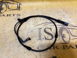 CZUJNIK ZUŻYCIA KLOCKÓW HAMULCOWYCH PRZÓD LEWY BMW X5 E70 X6 E71 NOWY OEM