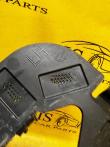 ŚLIZG MOCOWANIE ZDERZAKA RAMKA HALOGENU PRZÓD LEWY TESLA MODEL 3 PRZEDLIFT