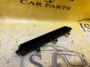 UCHWYT MONTAŻOWY KONSOLI ŚRODKOWEJ PODŁOKIETNIKA TESLA MODEL 3 PRZEDLIFT