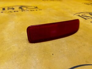 ODBLASK ODBŁYŚNIK ZDERZAKA TYŁ LEWY DACIA DOKKER