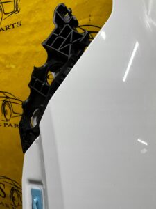 BŁOTNIK LEWY PRZÓD GENESIS GV70 BIAŁY AKRYL