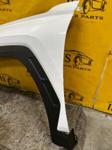 BŁOTNIK LISTWA SIERP LEWY PRZÓD HYUNDAI TUCSON IV KOLOR PYW