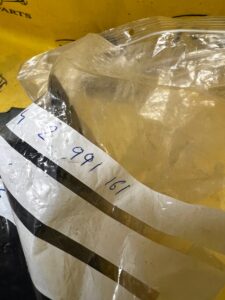 MOCOWANIE WSPORNIK ZAMKA MASKI LEWE LEWY BMW X1 E84 NOWE OEM