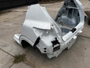 ĆWIARTKA BŁOTNIK WANNA PAS TYLNY TYŁ LEWY DACIA SANDERO STEPWAY III 369