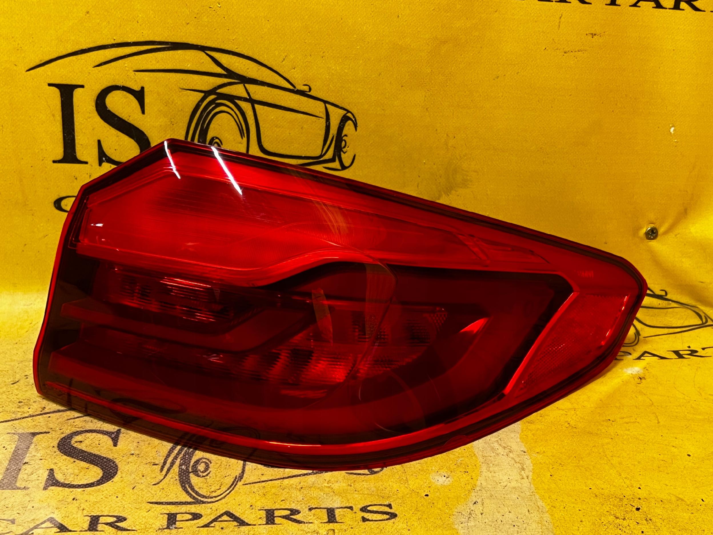 LAMPA TYLNA W BŁOTNIK PRAWA BMW G30 LEKKO PĘKNIĘTA