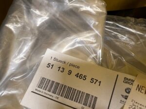 PODSTAWA RAMKA PRZEDNIEJ TABLICY REJESTRACYJNEJ PRZÓD USA MINI F60 NOWA OEM