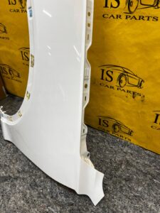 BŁOTNIK LEWY PRZÓD GENESIS GV70 BIAŁY AKRYL