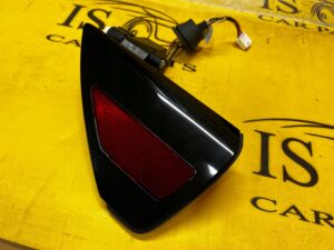 KLAPKA PORT ŁADOWANIA ODBLASK LAMPY TYŁ TYLNY LEWY TESLA MODEL 3 PRZEDLIFT