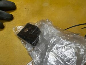 ZACZEP NAPRAWCZY REFLEKTORA HALOGENOWEGO ZEW LEWY BMW 3 E90 X1 E84 NOWY OEM