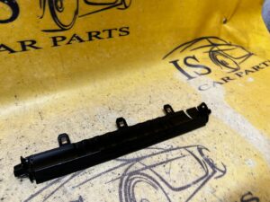 UCHWYT MONTAŻOWY KONSOLI ŚRODKOWEJ PODŁOKIETNIKA TESLA MODEL 3 PRZEDLIFT