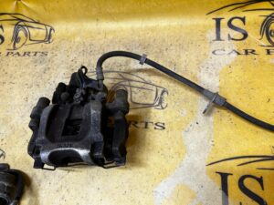 ZACISK HAMULCOWY TYŁ TYLNY LEWY RANGE ROVER EVOQUE II L551