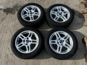KOŁA FELGI OPONY CAŁOROCZNE ZIMOWE FORD FIESTA MK7 185/60 R15