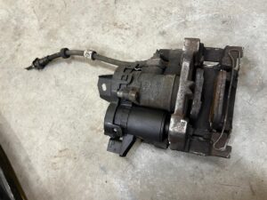 ZACISK HAMULCOWY ELEKTRYCZNY TYŁ LEWY VOLVO XC90 II