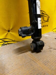 LAND ROVER DISCOVERY V L550 AMORTYZATOR TYLNY EL.