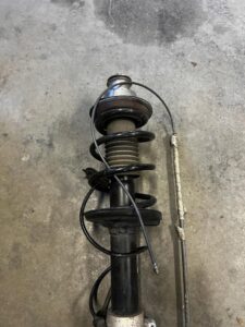 NOGA ZWROTNICA AMORTYZATOR TYŁ PRAWY PORSCHE CAYMAN S 987