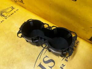 SCHOWEK UCHWYT NA KUBKI CUPHOLDER TUNELU ŚRODKOWEGO FORD BRONCO 21-