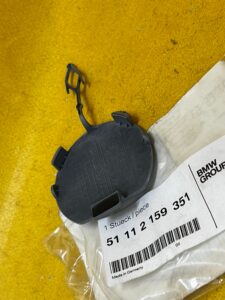 OSŁONA ZAŚLEPKA UCHA HOLOWNICZEGO PRZÓD LEWA BMW X6 E71 NOWA OEM