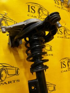 AMORTYZATOR WAHACZ GÓRNY PRZÓD LEWY TESLA MODEL 3 PRZEDLIFT RWD