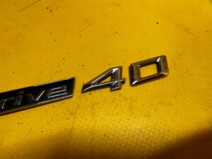 ORYGINALNY EMBLEMAT NAPIS DRZWI PRZÓD xDrive40d BMW X5 F15 X6 F16