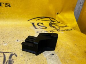 WSPORNIK ELEMENT USTALACJĄCY MOCUJĄCY KONSOLI ŚRODKOWEJ SKODA SCALA