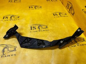 ŚLIZG MOCOWANIE UCHWYT LAMPY REFLEKTORA PRZÓD LEWY PORSCHE MACAN 95B