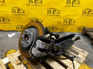 ZWROTNICA TYŁ KOMPLETNA ZACISK LEWA TESLA MODEL 3 2WD