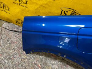 BŁOTNIK TYŁ LEWY FORD BRONCO 21- VELOCITY BLUE PEARL METALIC