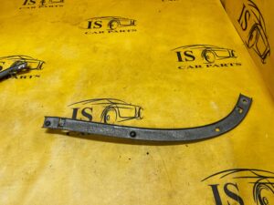 ŚLIZG MOCOWANIE WSPORNIK ZDERZAKA TYŁ LEWY CHEVROLET CORVETTE C5 97-04