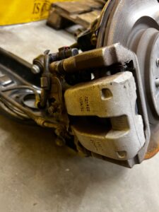 ZWROTNICA TYŁ KOMPLETNA ZACISK PRAWA TESLA MODEL 3 2WD