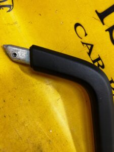 UCHWYT RĄCZKA TUNELU PODŁOKIETNIKA LEWY PORSCHE CAYENNE II 7P5 LIFT 92A