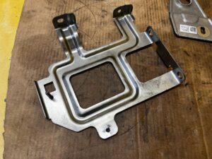 WSPORNIK UCHWYT MOCOWANIE MODUŁU STEROWNIKA FORD BRONCO 21-