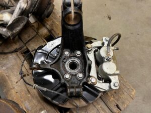 NOWA ZWROTNICA ZACISK PIASTA ZAWIESZENIE PRZÓD LEWY NISSAN X-TRAIL T32