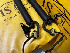 KOMPLET SIŁOWNIKI ELEKTRYCZNE KLAPY TYŁ BAGAŻNIKA FORD EXPLORER MK6