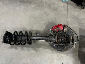 NOWA NOGA ZWROTNICA AMORTYZATOR MCPHERSON PRZÓD LEWY KIA SORENTO III CRDI