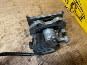 ZACISK HAMULCOWY ELEKTRYCZNY TYŁ LEWY FORD EXPLORER VI MK6