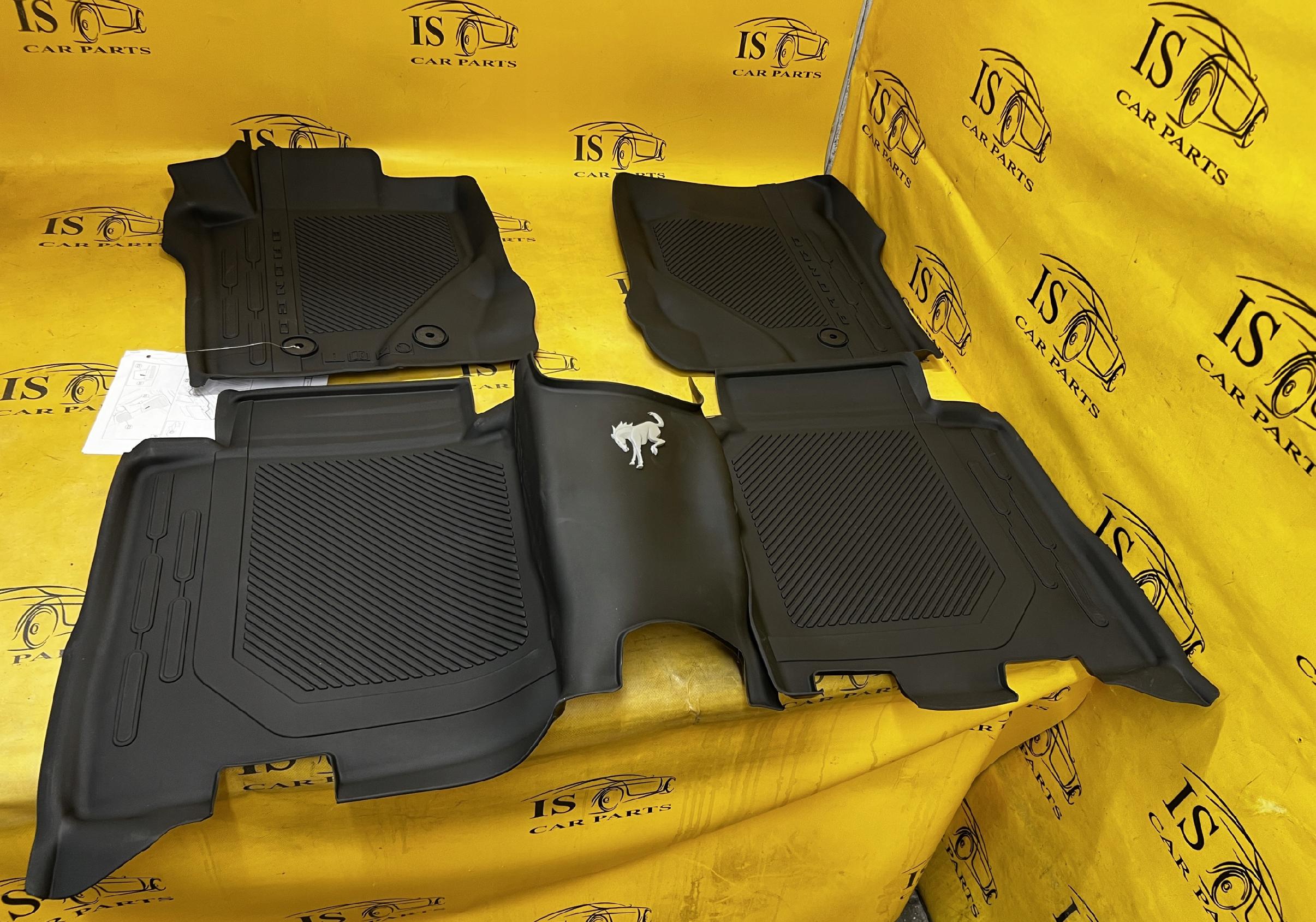 DYWANIKI WYCIERACZKI GUMOWE ORYGINALNE 4 DRZWI FORD BRONCO 21- NOWE OEM