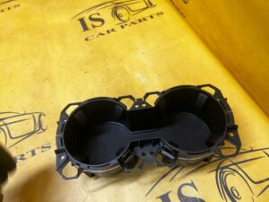 SCHOWEK UCHWYT NA KUBKI CUPHOLDER TUNELU ŚRODKOWEGO FORD BRONCO 21-