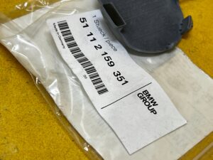 OSŁONA ZAŚLEPKA UCHA HOLOWNICZEGO PRZÓD LEWA BMW X6 E71 NOWA OEM