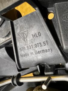 MOCOWANIE UCHWYT LAMPY REFLEKTORA PRZÓD LEWY PORSCHE PANAMERA 970 I LIFT