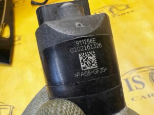 SILNICZEK SIŁOWNIK HAMULCA RĘCZNEGO TYŁ LEWY PORSCHE PANAMERA 970 I LIFT