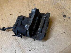 ZACISK HAMULCOWY ELEKTRYCZNY TYŁ LEWY MERCEDES GL X166