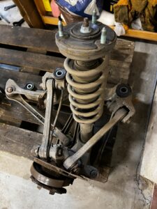 ZWROTNICA AMORTYZATOR WAHACZE TYŁ LEWY PORSCHE CARRERA 911 996 3.4 2WD RWD