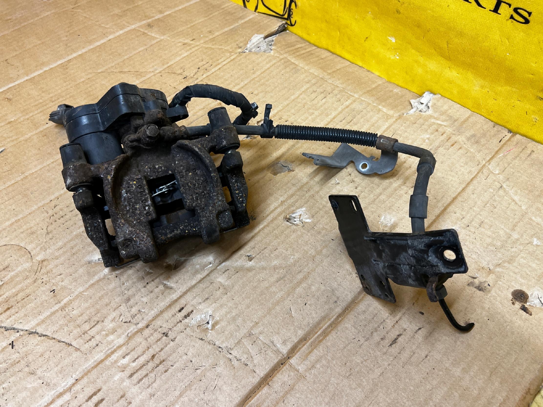 ZACISK HAMULCOWY ELEKTRYCZNY TYŁ PRAWY FORD FUSION LIFT USA 2.0 ECOBOOST